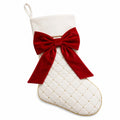 Calza decorativa natalizia 45 cm in tessuto bianco trapuntato con fiocco rosso e asola da appendere